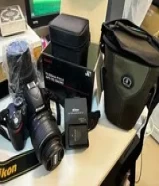 Nikon D3200 24.2 Megapixel DSLR Camera + 18-55mm Lens + Sigma 70-300mm