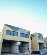 ورشة للإيجار في الشويخ - سقف عالي وكهرباء ثلاث فاز Prime Shuwaikh Workshop for Rent - High Ceiling