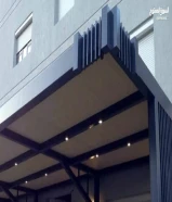 عمل جميع انواع مظلات السيارات( ك سبان - خام - بي في سي - خشبيه) وكذلك جميع اعمال الحداده