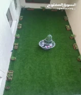 تنسيق حدائق وتركيب الثيل الصناعى والسور التركى وزرع الثيل الطبيعى