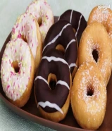 دونات 9 حبات بدينارين ونص و18 حبة بـ 4 دينار ونص