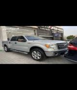 للبيع وللبدل فورد F150 دبل قير XLT غمارتين موديل 2013 عداد 190 الف كيلو لون سلفر داخل دبيج بحالة الوكالة