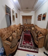 Used sofa for sale by Safat Al-Ghanim, in excellent condition, with wood table + curtains